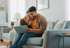 Man and woman on a laptop 